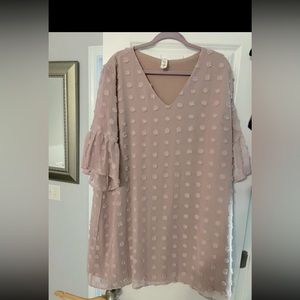 Pink flowing dress with bell sleeves